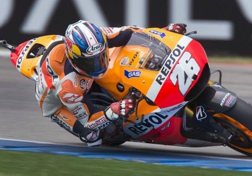Honda MotoGP rider Pedrosa of Spain takes a curve during the Dutch Grand Prix in Assen