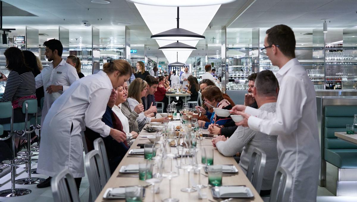 People dining at Test Kitchen, our experimental eatery.