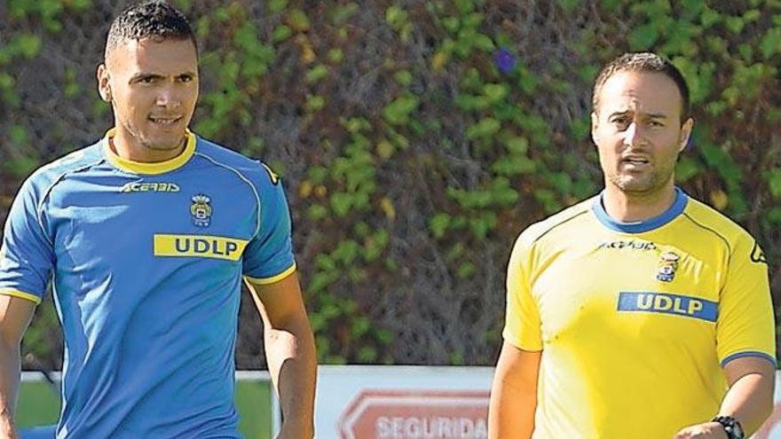 Marcelo Silva junto a Juan Naranjo en el entrenamiento del sábado.