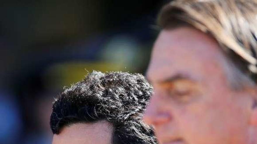 Moro, a la izquierda, y el presidente brasileño, Jair Bolsonaro. // Reuters