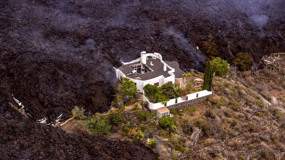 La lava del volcán de La Palma cubre ya 106 hectáreas y destruye 166 casas