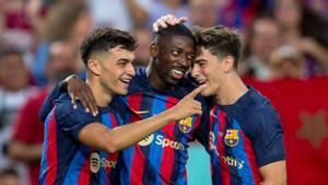 Pedri, Dembélé y Gavi celebran un gol contra el Pumas en el Gamper.