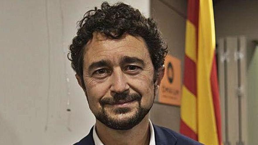 Calvet, amb el nou llibre de Josep Rull, que dilluns va presentar a Manresa