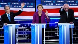 Senator Elizabeth Warren speaks as former New York City Mayor Mike Bloomberg and Senator Bernie Sanders try to get the moderators’ attention at the ninth Democratic 2020 U.S. Presidential candidates debate at the Paris Theater in Las Vegas Nevada, U.S., February 19, 2020.     TPX IMAGES OF THE DAY