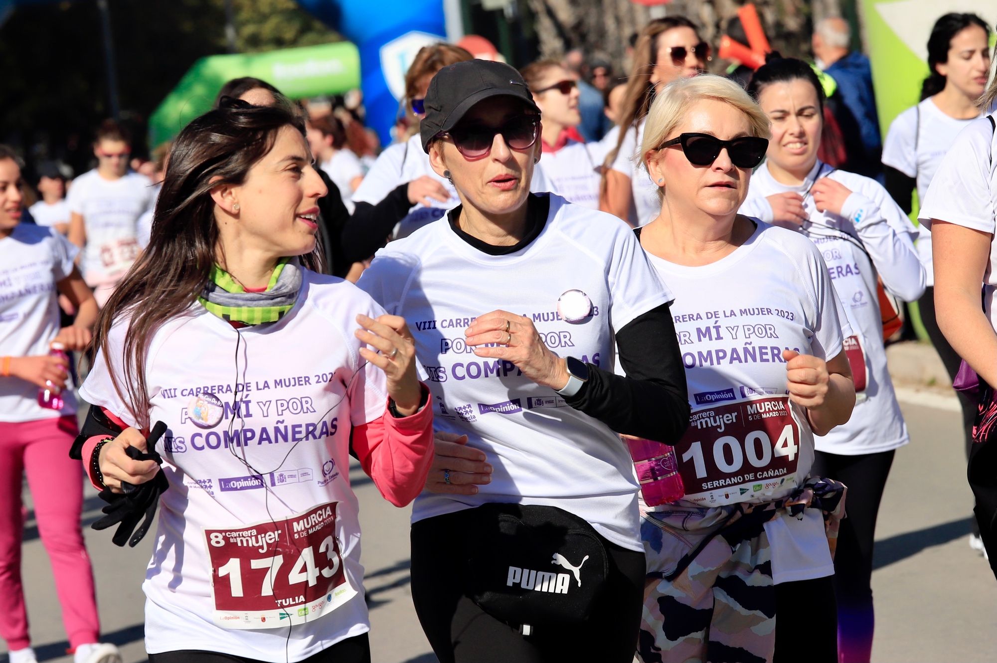 La salida y el recorrido de la Carrera de la Mujer 'inmortalizados' en imágenes