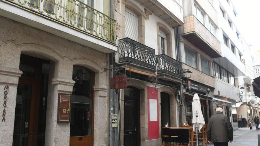Calle de los Olmos, en la zona más saturada de pisos turísticos. | | C. P.