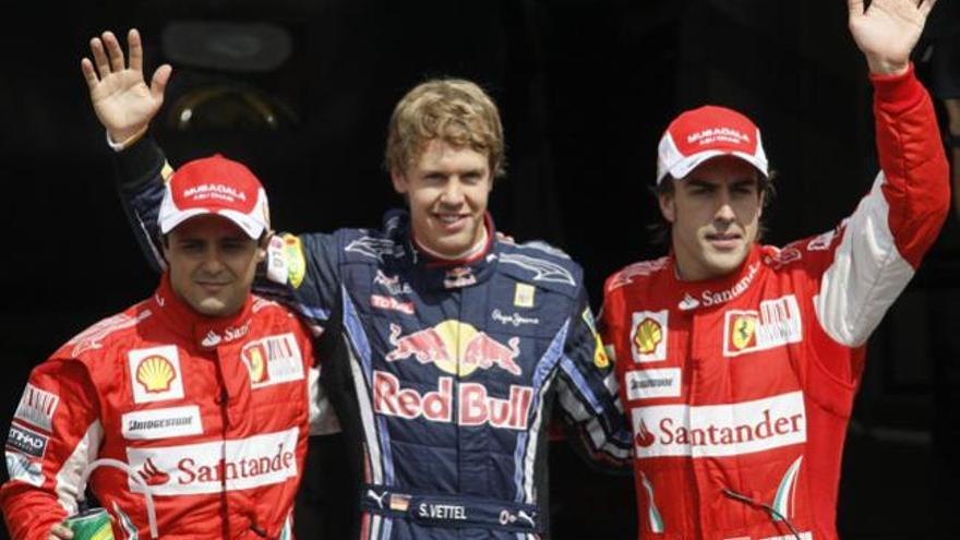 Sebastian Vettel, Fernando Alonso y Felipe Massa, ocupando las tres primeras plazas del pódium.