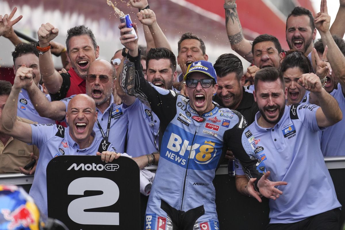 Spains Alex Marquez of the BK8 Gresini Racing MotoGP Team, center, celebrates finishing second place at the MotoGP race in Termas de Rio Hondo circuit, Argentina, Sunday, March 16, 2025. (AP Photo/Gustavo Garello)
