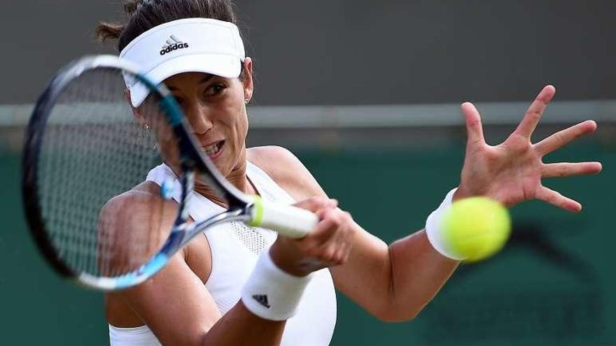 Muguruza, durante su partido de ayer ante Wickmayer. // G. Perry