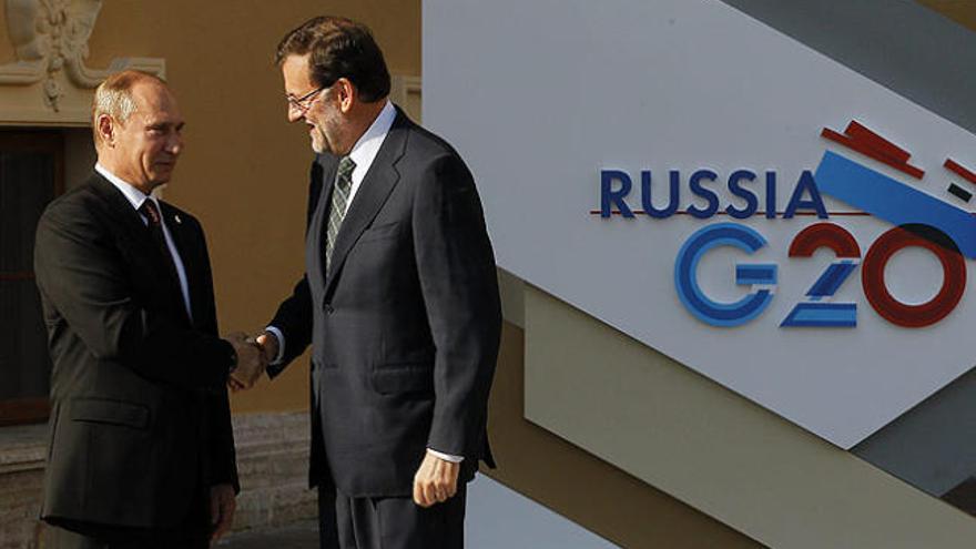 Mariano Rajoy, junto a Vladímir Putin.