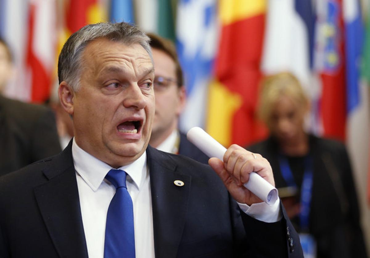 Hungary’s Prime Minister Viktor Orban reacts as he leaves a European Union leaders summit in Brussels, Belgium December 18, 2015.    REUTERS/Francois Lenoir