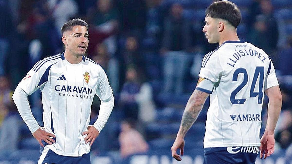 Toni Moya y Lluís López, en el derbi ante el Huesca.