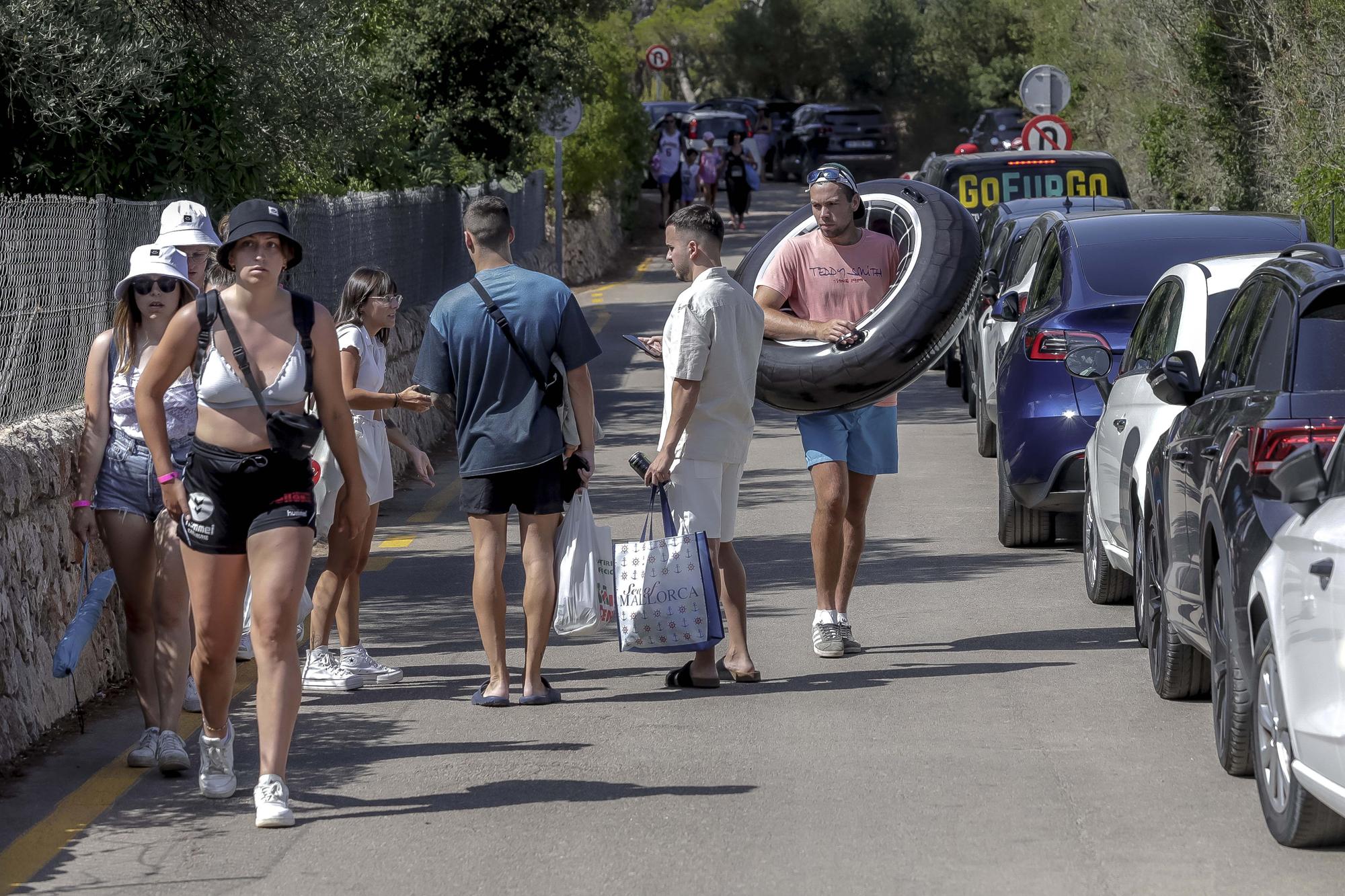 Fotos | El Caló des Moro, saturado de turistas