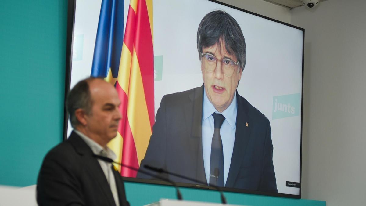 El secretario general de Junts, Jordi Turull, y el presidente de esta formación, Carles Puigdemont-