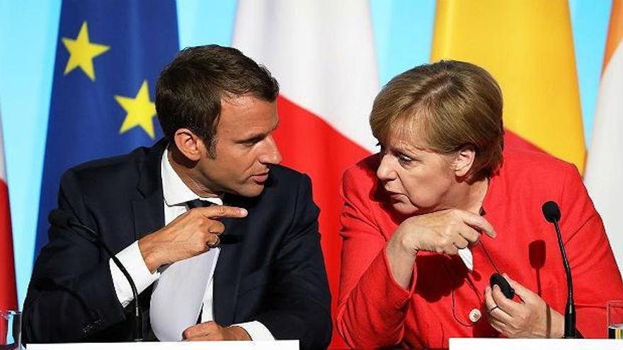 Macron y Merkel cierran filas con Rajoy en vísperas del 155