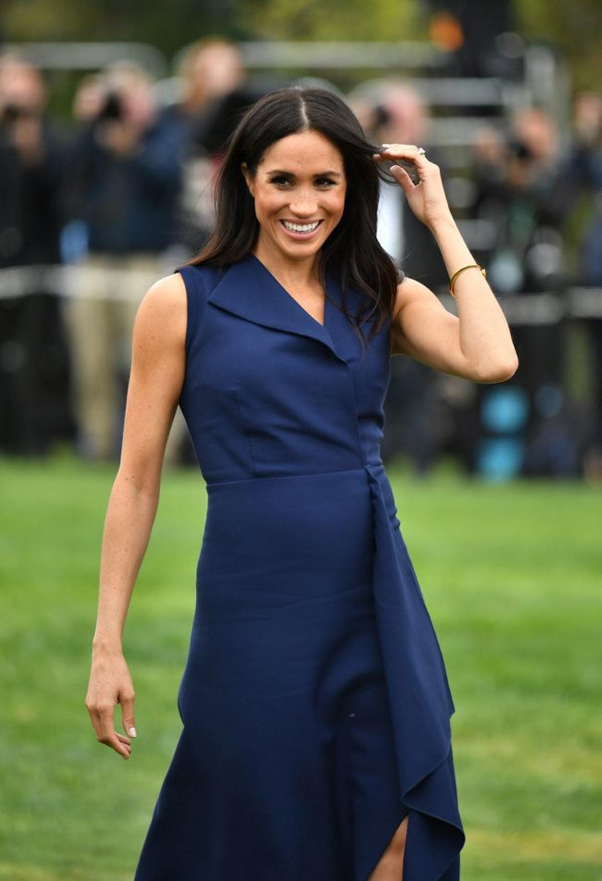 Meghan sonriente en su visita a Melbourne