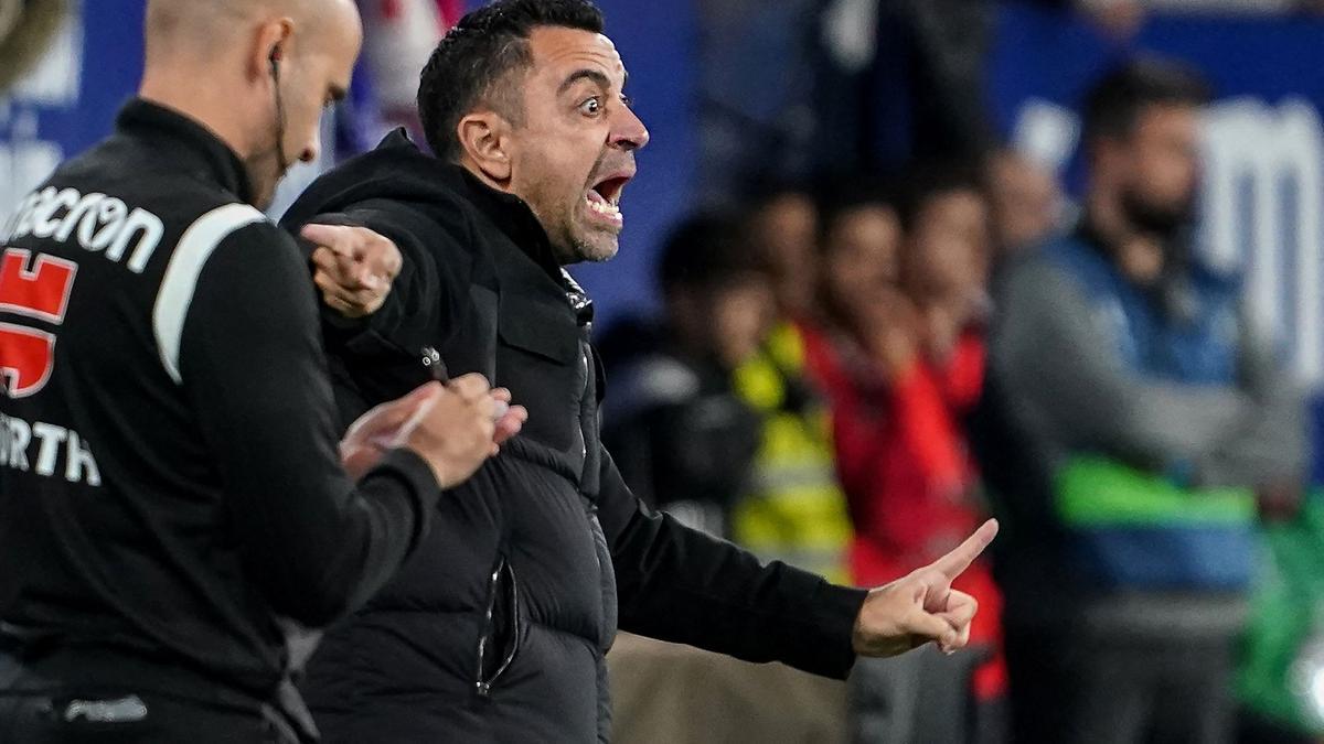 Barcelona's Spanish coach Xavi reacts during the Spanish league football match between CA Osasuna and FC Barcelona at El Sadar stadium in Pamplona on November 8, 2022. (Photo by CESAR MANSO / AFP)