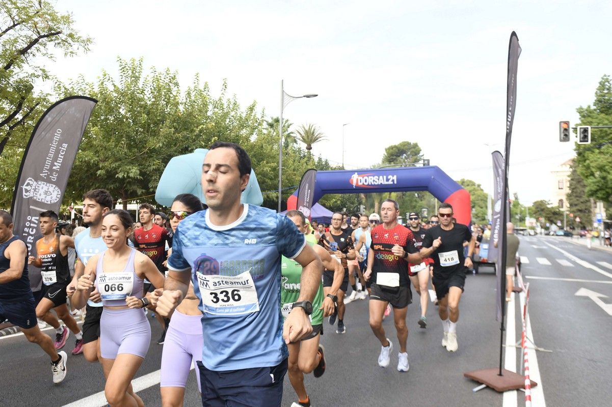 La carrera y marcha Solidaria Asteamur, en imágenes