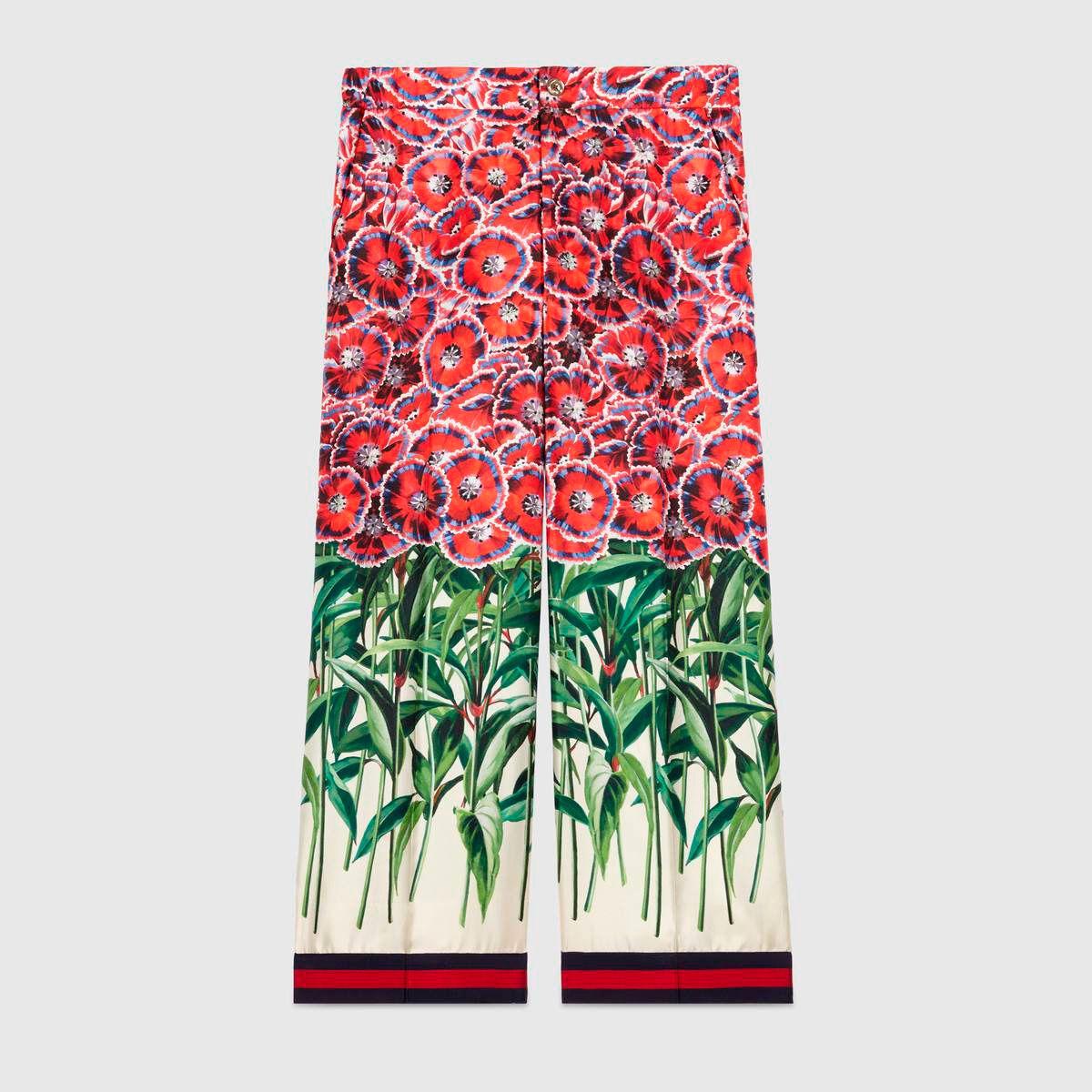 Pantalón con print floral y ribete bicolor de Gucci