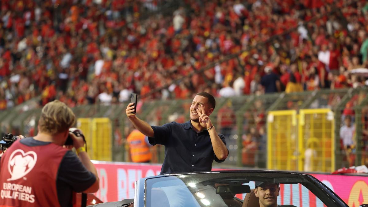 Former Red Devils captain Eden Hazard greets fans during a ceremony for the end of his career with the Belgian national team Red Devils at half-time of the UEFA Euro 2024, European Qualifiers, Group F, football match between Belgium and Austria on June 17