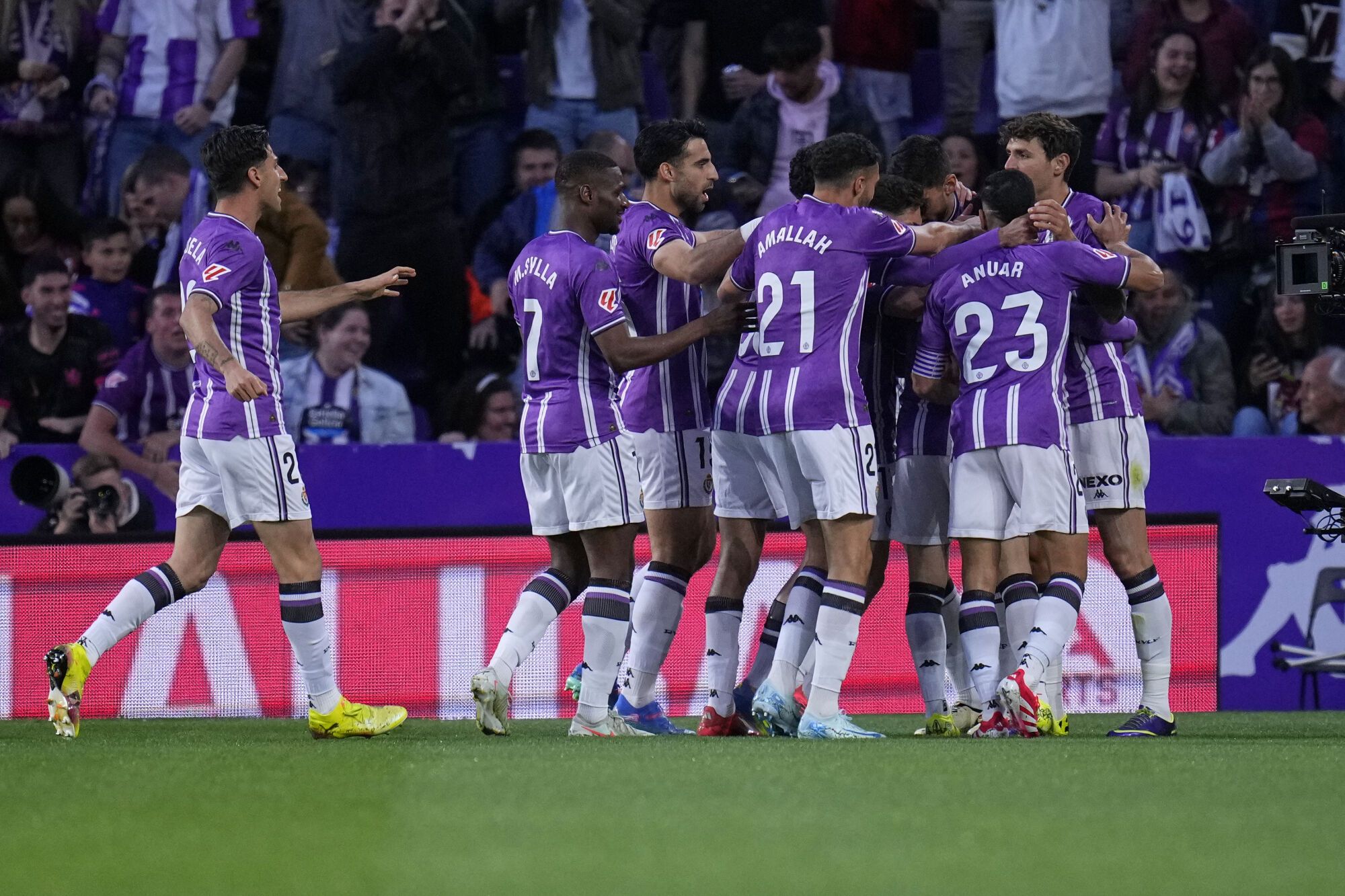Valladolid's Ivan Sanchez celebrates with teammates after scoring the opening goal during the Spanish La Liga soccer match between Valladolid and FC Barcelona at the Jose Zorrilla stadium in Valladolid, Spain, Saturday, May 3, 2025. (AP Photo/Manu Fernandez)
