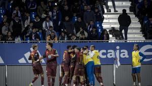 Los jugadores del Deportivo celebran uno de los dos goles marcados en la primera vuelta en el Ibercaja Estadio.