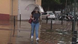 Lluvias en Catalunya: lluvia en las calles de Barcelona