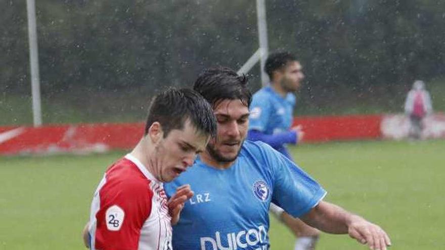 El defensa rojiblanco Guille Rosas controla el balón ante Cedenilla durante el partido de ayer en Mareo.