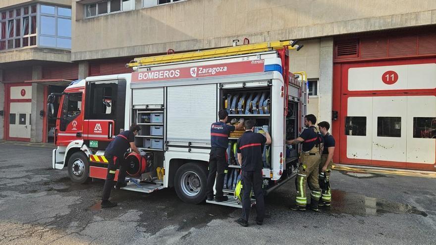 Bomberos de Zaragoza trabajando en la zona afectada por los incendios en Madrid