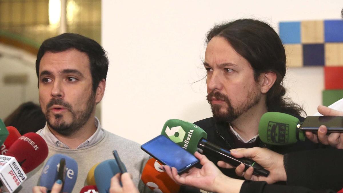 Alberto Garzón y Pablo Iglesias, en una reunión el pasado mes de diciembre.