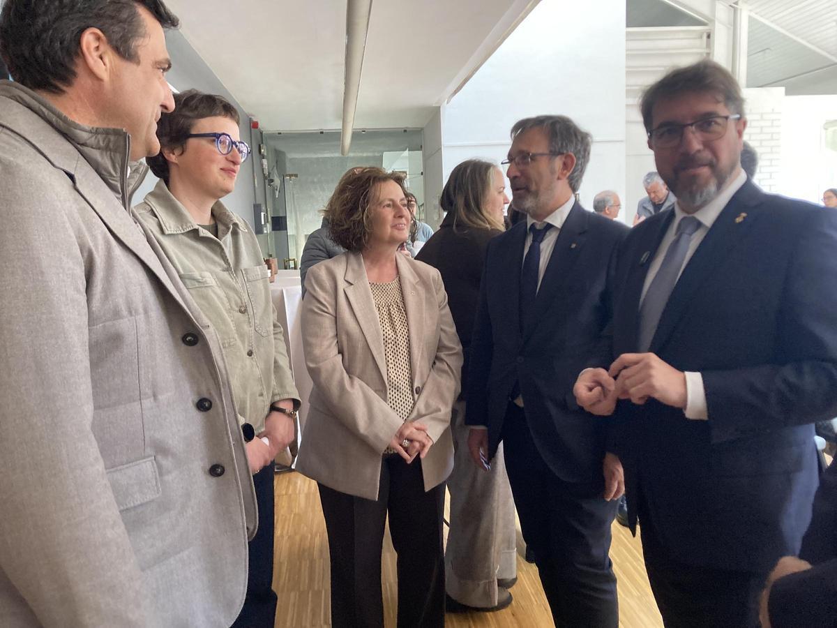 El conseller amb l'alcalde de Puigcerdà en l'arribada a l'acte