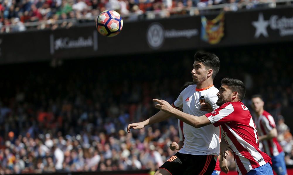 El partido entre el Valencia y el Sporting, en imágenes