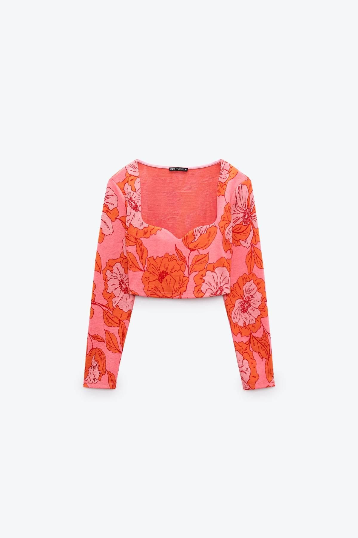 Top de manga larga con estampado floral rosa y rojo