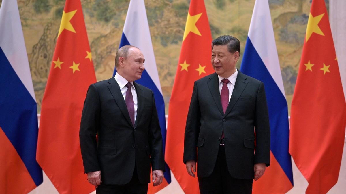 Vladimir Putin, con Xi Jinping.