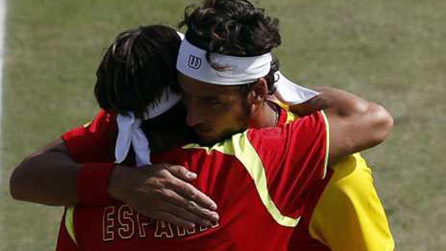 Ferrer y Feliciano se abrazan tras perder el bronce.