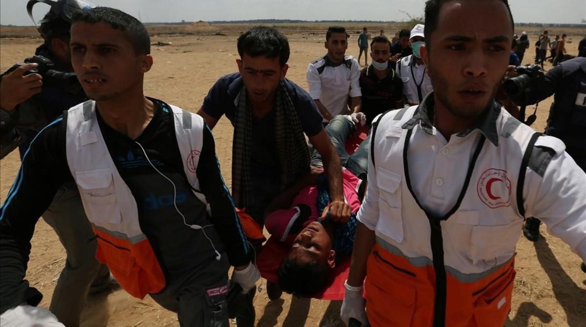 vvargas43323931 a wounded palestinian is evacuated during a protest against 180514102553