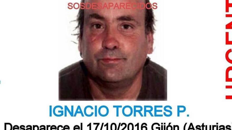 Cartel con el rostro del desaparecido.