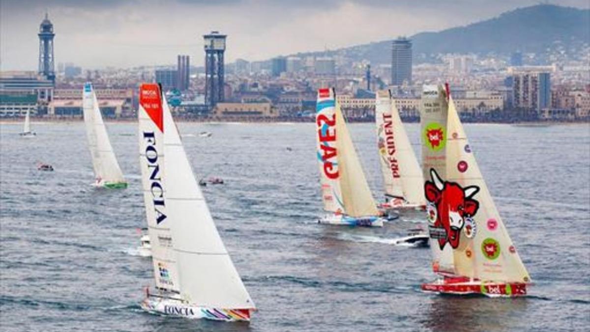 Imagen de la salida de la tercera Barcelona World Race, el 31 de diciembre del 2014, con la ciudad al fondo.