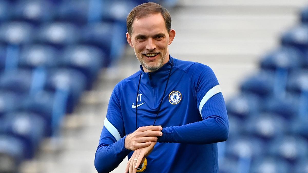 Chelsea’s German coach Thomas Tuchel smiles during a training session at the Dragao stadium in Porto on May 28, 2021 on the eve of the UEFA Champions League final football match between Manchester City and Chelsea. (Photo by PIERRE-PHILIPPE MARCOU / AFP)