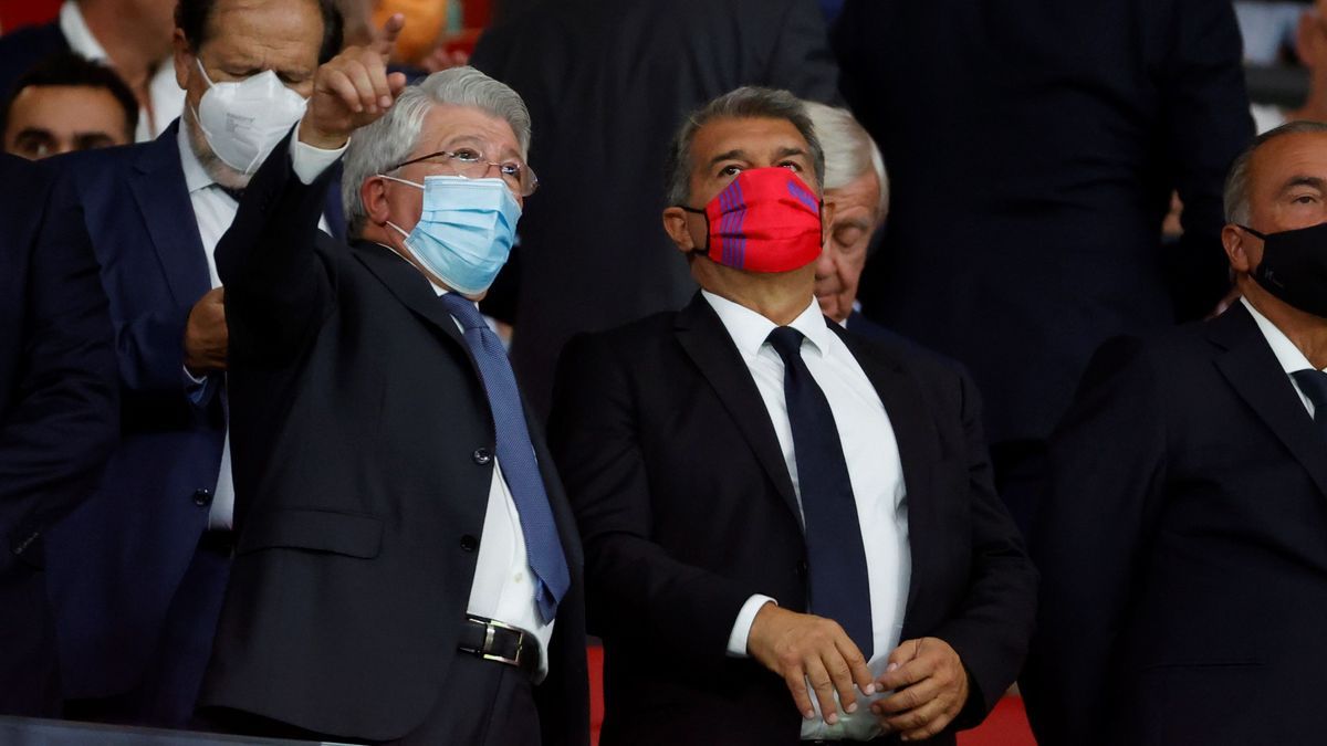 Cerezo y Laporta, en la grada del Wanda antes del partido.