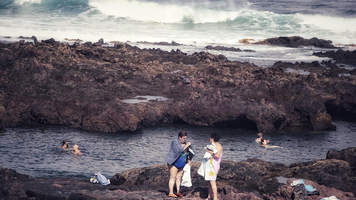 Bathers in the Punta del Hidalgo puddle in a file image.