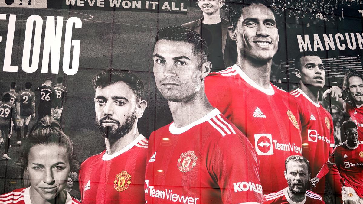 Cartel en Old Trafford con Cristiano y Varane destacados.