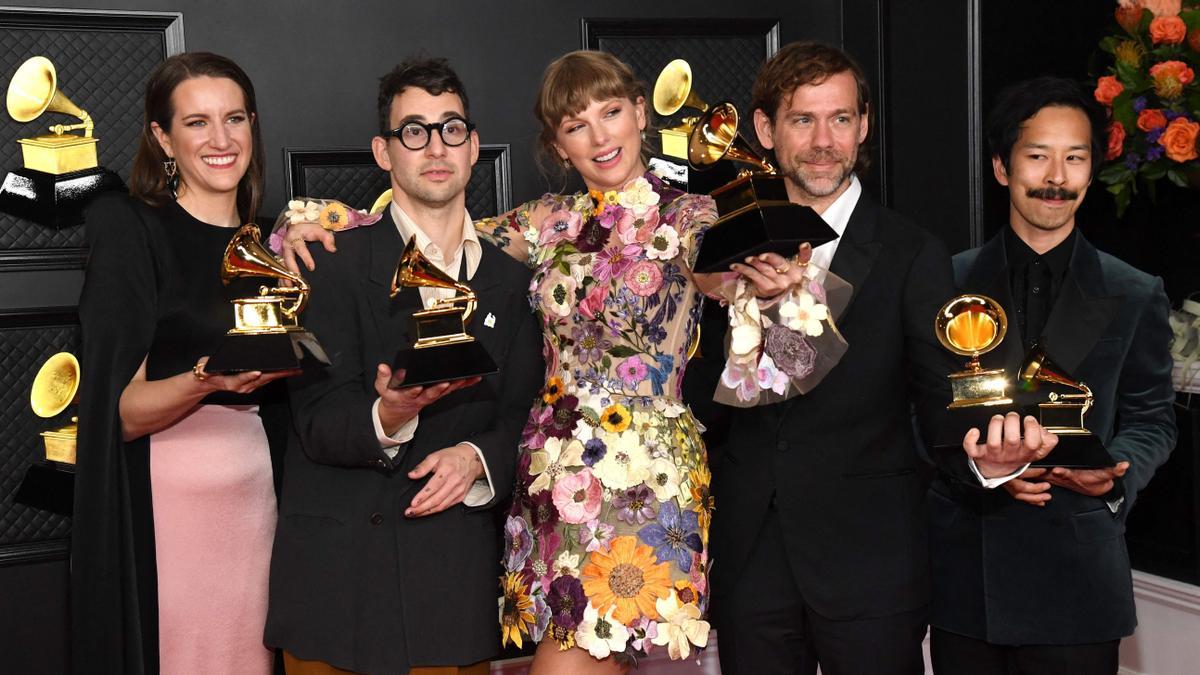 - In this handout photo courtesy of The Recording Academy, (L-R) Laura Sisk, Jack Antonoff, Taylor Swift, Aaron Dessner, and Jonathan Low, winners of the Album of the Year award for ?Folklore,? pose in the media room during the 63rd Annual GRAMMY Awards at Los Angeles Convention Center on March 14, 2021 in Los Angeles, California. (Photo by Kevin Mazur / The Recording Academy / AFP) / RESTRICTED TO EDITORIAL USE - MANDATORY CREDIT &quot;AFP PHOTO / Kevin MAZUR / The Recording Academy via Getty Images&quot; -