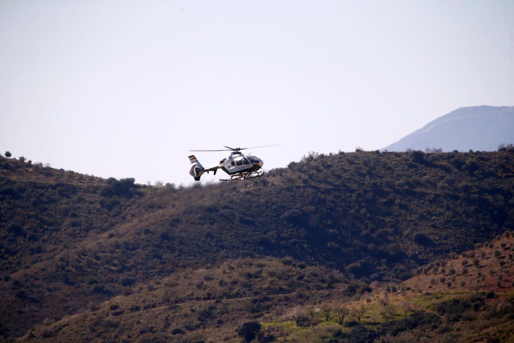 A Spanish Civil Guard helicopter lands carrying ...