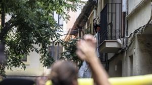 Cinc menors frenen el desnonament d’un local ocupat