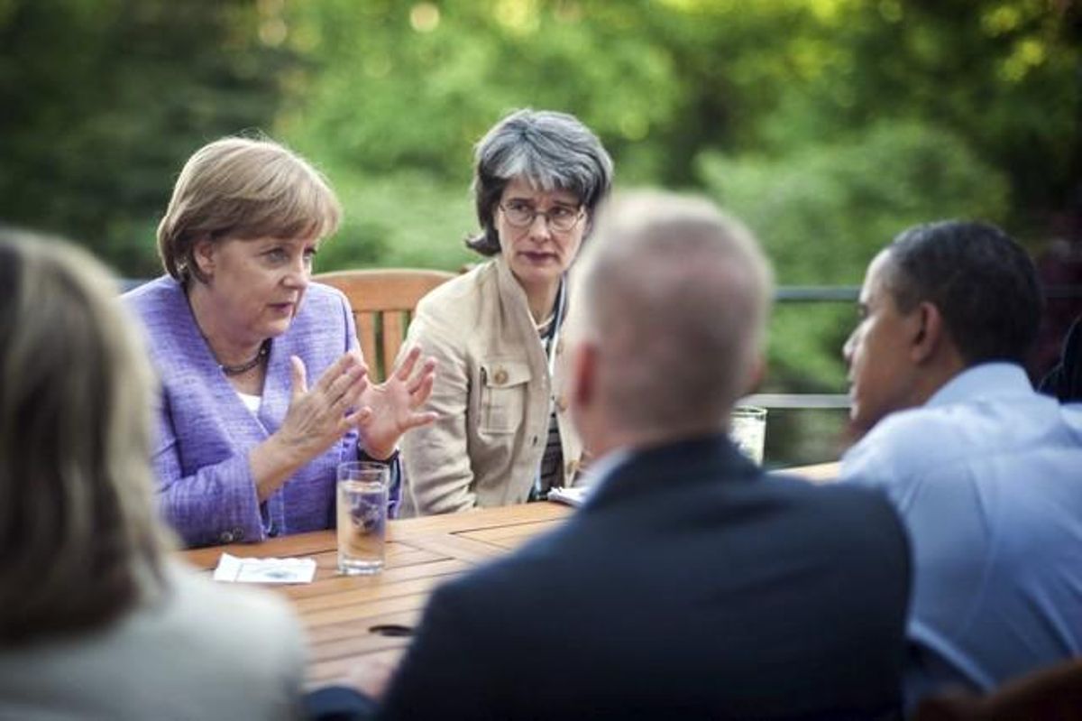 Les delegacions nord-americana i alemanya, encapçalada pel president nord-americà, Barack Obama (dreta), i per la cancellera alemanya, Angela Merkel, durant el G-8.
