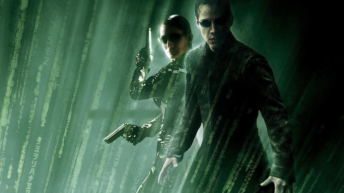 Keanu Reeves y Carrie-Anne Moss, en una imagen promocional de la trilogía original de 'Matrix'