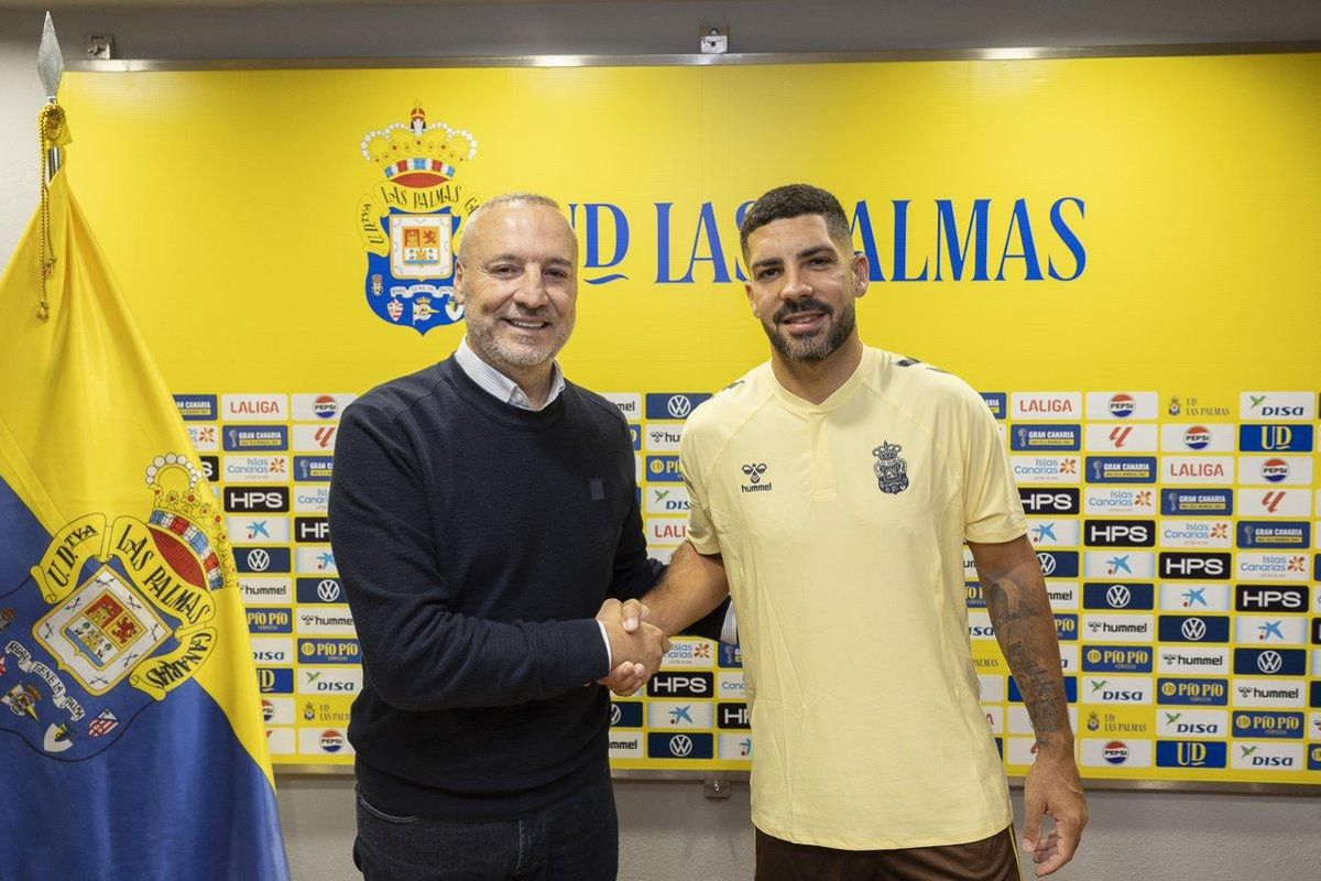Ramírez posa con Suárez.
