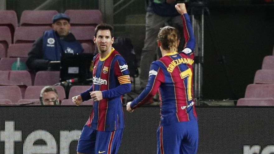 Messi y Griezmann celebran un gol del argentino