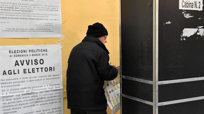 fcasals42387947 a citizen prepares to vote on march 4  2018 at a polling sta180304141336